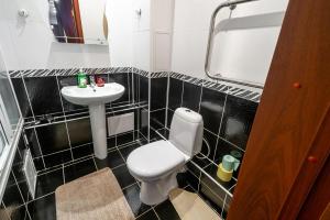 Ванна кімната в Centralnye Apartments