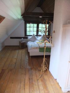 a bedroom with a bed in a attic at Ferienwohnung Scholter in Eichstegen