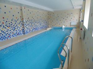 a large swimming pool in a building at Sanatoriy Bobachevskaya Roshcha in Tver