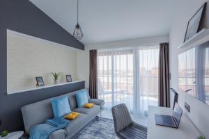 TV a/nebo společenská místnost v ubytování Noir Hotel - Penthouse Apartman