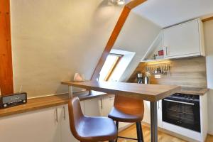Kuchyň nebo kuchyňský kout v ubytování Ferienwohnung Weinterrassen + 8 fotografií