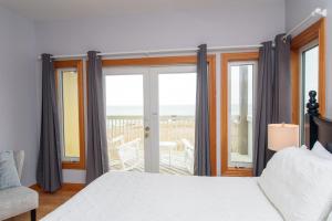 Ein Bett oder Betten in einem Zimmer der Unterkunft The Inn on Pamlico Sound