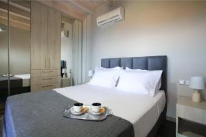 Ένα ή περισσότερα κρεβάτια σε δωμάτιο στο Design Villa Nicol - Heated Pool - Summer kitchen +17 φωτογραφίες