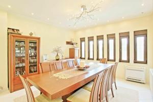 A seating area at Acharavi Beach Villa by PosarelliVillas