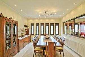 A restaurant or other place to eat at Acharavi Beach Villa by PosarelliVillas