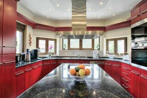 A kitchen or kitchenette at Acharavi Beach Villa by PosarelliVillas