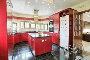 A kitchen or kitchenette at Acharavi Beach Villa by PosarelliVillas