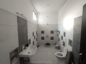 Koupelna v ubytování Samadhan Home Stay + 36 fotografií