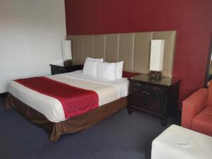 Postel nebo postele na pokoji v ubytování Hotel Pigeon Forge