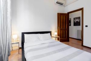Posteľ alebo postele v izbe v ubytovaní Happy & Beautiful Flat in Central Milan