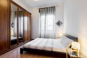 Posteľ alebo postele v izbe v ubytovaní Happy & Beautiful Flat in Central Milan
