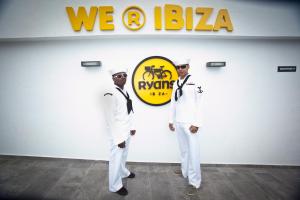 two men standing next to each other in front of a building at Ryans Ibiza Apartments - Only Adults in Ibiza Town