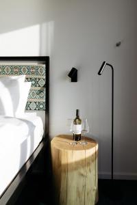 Postel nebo postele na pokoji v ubytování Kartuli Hotel