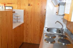 Kuchyň nebo kuchyňský kout v ubytování Appartamenti Vacanze Casa -Residence Albare - check in Vacanze Casa - Marilleva 900 + 37 fotografií