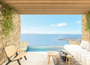 a living room with a view of the ocean at Eden View Suites & Villas in Paradise Beach