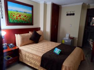 Voodi või voodid majutusasutuse HOTEL ACHALAY toas