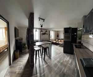 Köök või kööginurk majutusasutuses Le velocipede