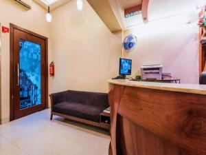 TV a/nebo společenská místnost v ubytování Hotel Broadway Colaba