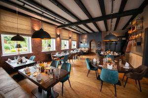 Posezení v ubytování Hotel & Restaurant Alte Schule