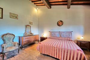 Un ou plusieurs lits dans un hébergement de l'établissement Casale Giotto by PosarelliVillas