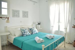 Postel nebo postele na pokoji v ubytování Parodise Apartment