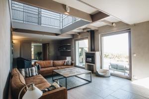 Posezení v ubytování Magnifique propriété avec vues panoramiques et piscine privée + 24 fotografií