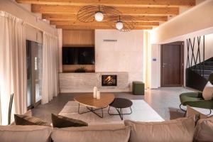 Posezení v ubytování The Olive Tree Villa Elounda
