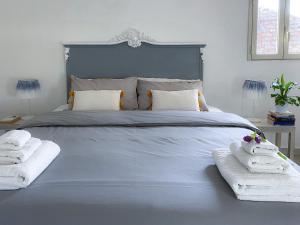 Postel nebo postele na pokoji v ubytování Catania Bedda Home