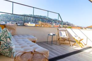 A balcony or terrace at Zefiro Home Pesaro Zona Mare e San Bartolo by Yohome