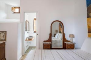 Postel nebo postele na pokoji v ubytování Iancura - B&B di design a Salina