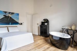 Postel nebo postele na pokoji v ubytování Iancura - B&B di design a Salina