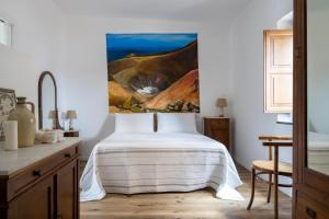Postel nebo postele na pokoji v ubytování Iancura - B&B di design a Salina