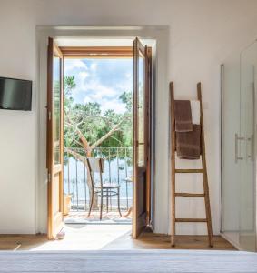TV a/nebo společenská místnost v ubytování Iancura - B&B di design a Salina