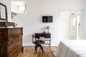 Postel nebo postele na pokoji v ubytování Iancura - B&B di design a Salina