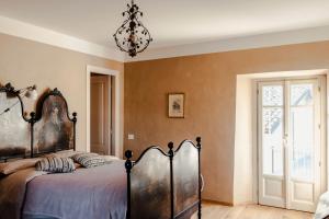 Postel nebo postele na pokoji v ubytování Casa Novella