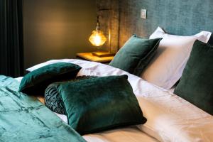 Postel nebo postele na pokoji v ubytování Le Gite de l'Anecdote