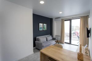 Χώρος καθιστικού στο Plexanov Apartments +1 φωτογραφίες