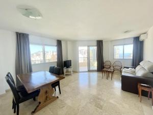 A seating area at TORRE VALENCIA LEVANTE BEACH