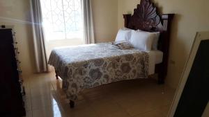 Ένα ή περισσότερα κρεβάτια σε δωμάτιο στο Chad's Island Retreat