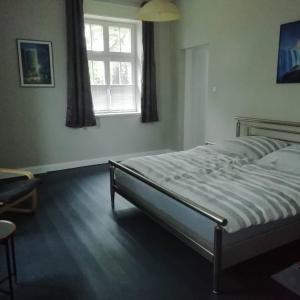 Un pat sau paturi într-o cameră la Ferienvermietung Reinstorf