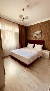 Katil atau katil-katil dalam bilik di Rio Suite Hotel