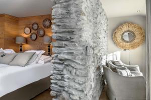Postel nebo postele na pokoji v ubytování Unique Hotel Post