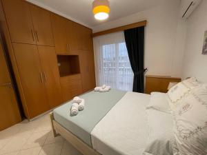 Posteľ alebo postele v izbe v ubytovaní The Gemini Suites