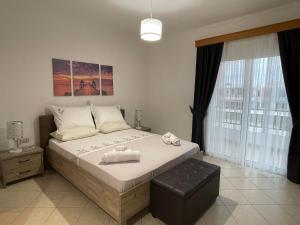Posteľ alebo postele v izbe v ubytovaní The Gemini Suites