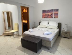 Posteľ alebo postele v izbe v ubytovaní The Gemini Suites
