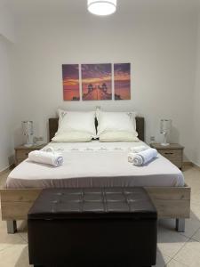 Posteľ alebo postele v izbe v ubytovaní The Gemini Suites