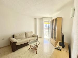 Telewizja i/lub zestaw kina domowego w obiekcie TORRE VALENCIA APARTMENT