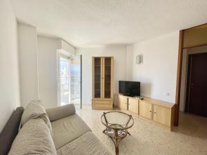 Telewizja i/lub zestaw kina domowego w obiekcie TORRE VALENCIA APARTMENT