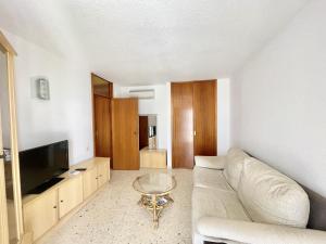 Telewizja i/lub zestaw kina domowego w obiekcie TORRE VALENCIA APARTMENT