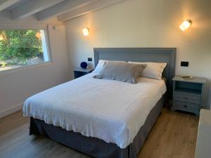 Postelja oz. postelje v sobi nastanitve Il Giardino Segreto Gardasee Ferienhaus